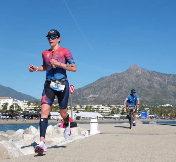 Alpha State one to one coaching expert Frankie, mid race on the seafront