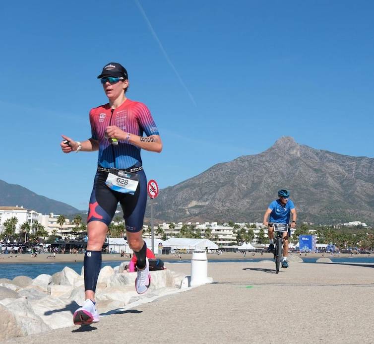 Alpha State one to one coaching expert Frankie, mid race on the seafront