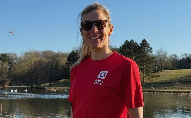 Alpha State one to one coach Frankie, leading at a race event